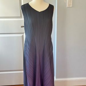 The brand is Alquema. This is a dress and jacket that fits all.